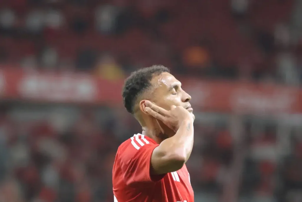 Imagem do jogador Alan Patrick comemorando gol pelo Internacional. Foto: Ricardo Duarte/Internacional