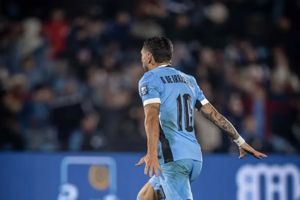 Imagem do jogador Giorgian De Arrascaeta comemorando gol pelo Uruguai. Foto: Seleção Uruguaia/Instagram